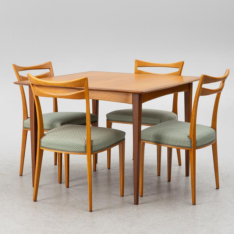 A dining table and four chairs, 1950s-60s.