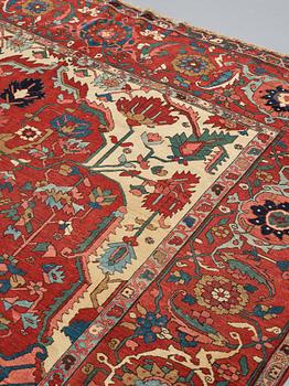 A CARPET, an antique Heriz, a so called Serapi, ca 371 x 282,5 cm.