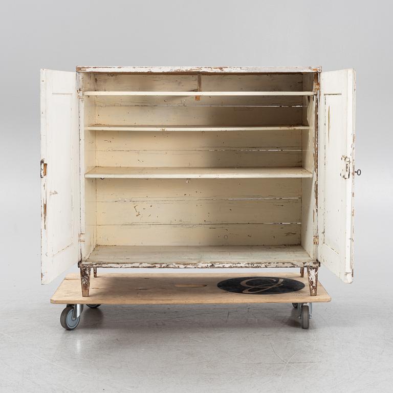 A painted cabinet from arond the year 1900.