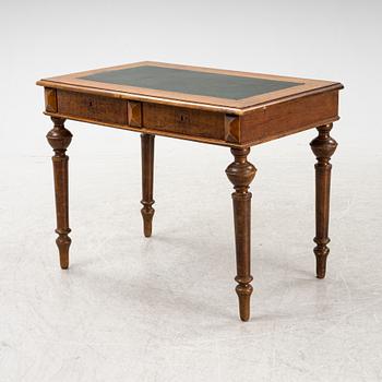 A Renaissance style writing desk from around the year 1900.