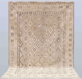 A Kelim carpet, 295 x 210 cm.