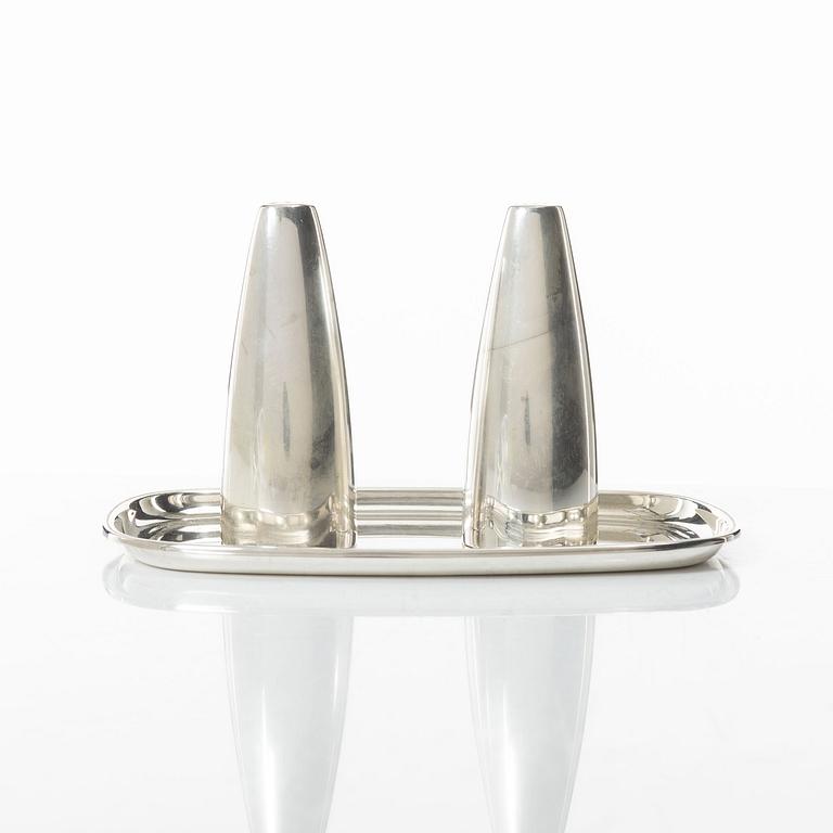 Salt and pepper shakers and tray, silver, including Henning Koppel for Georg Jensen, Denmark.
