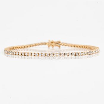 Tennisarmband 18K guld med briljantslipade diamanter.