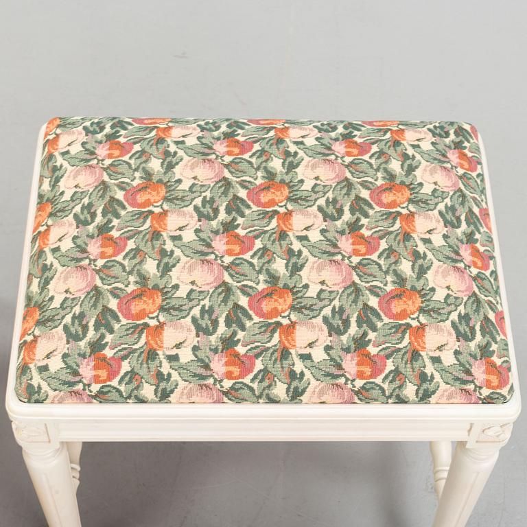 A dining table with eight chairs and a stool, Gustavian style, second half of the 20th Century.