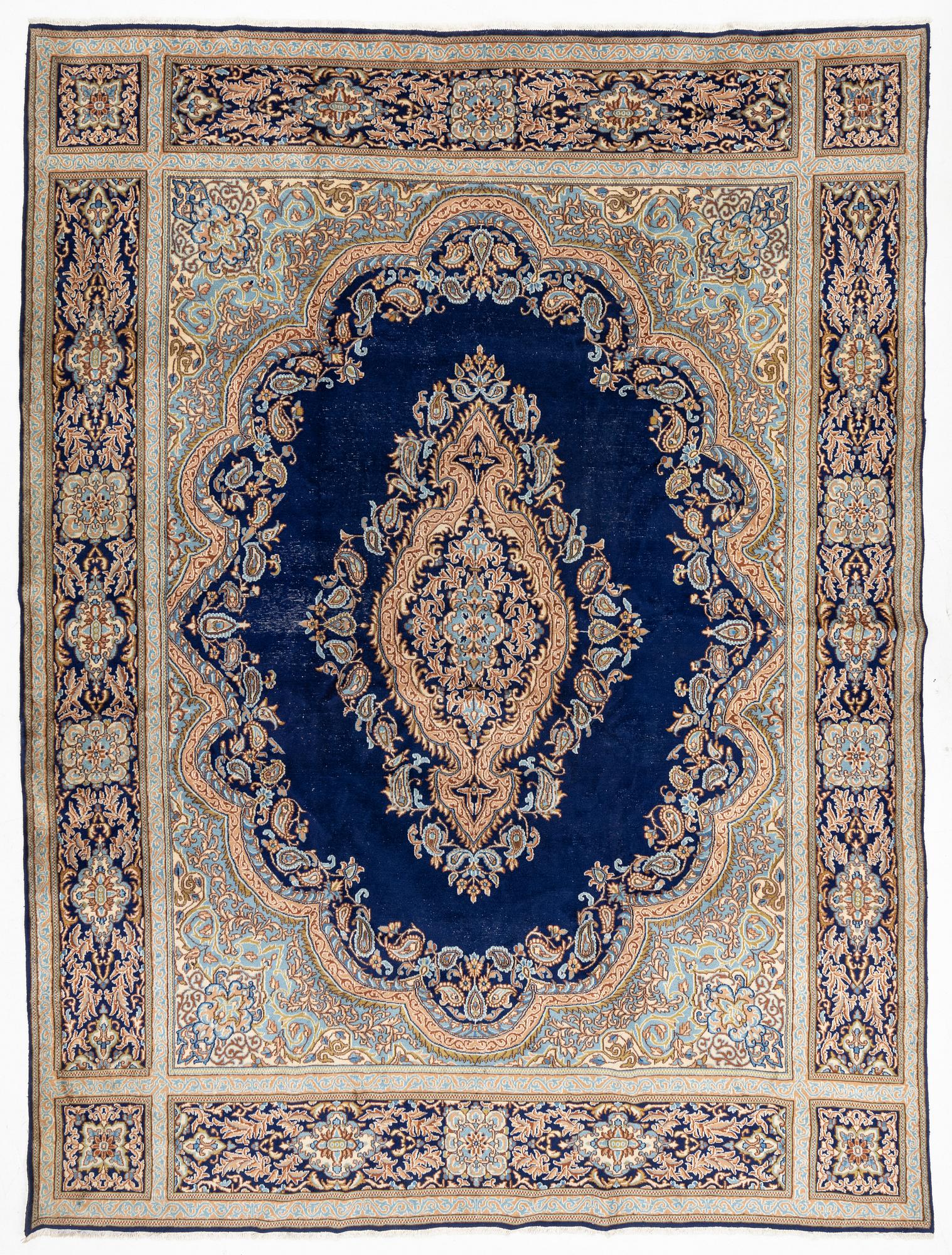 A Kerman carpet, circa 403 x 301 cm.