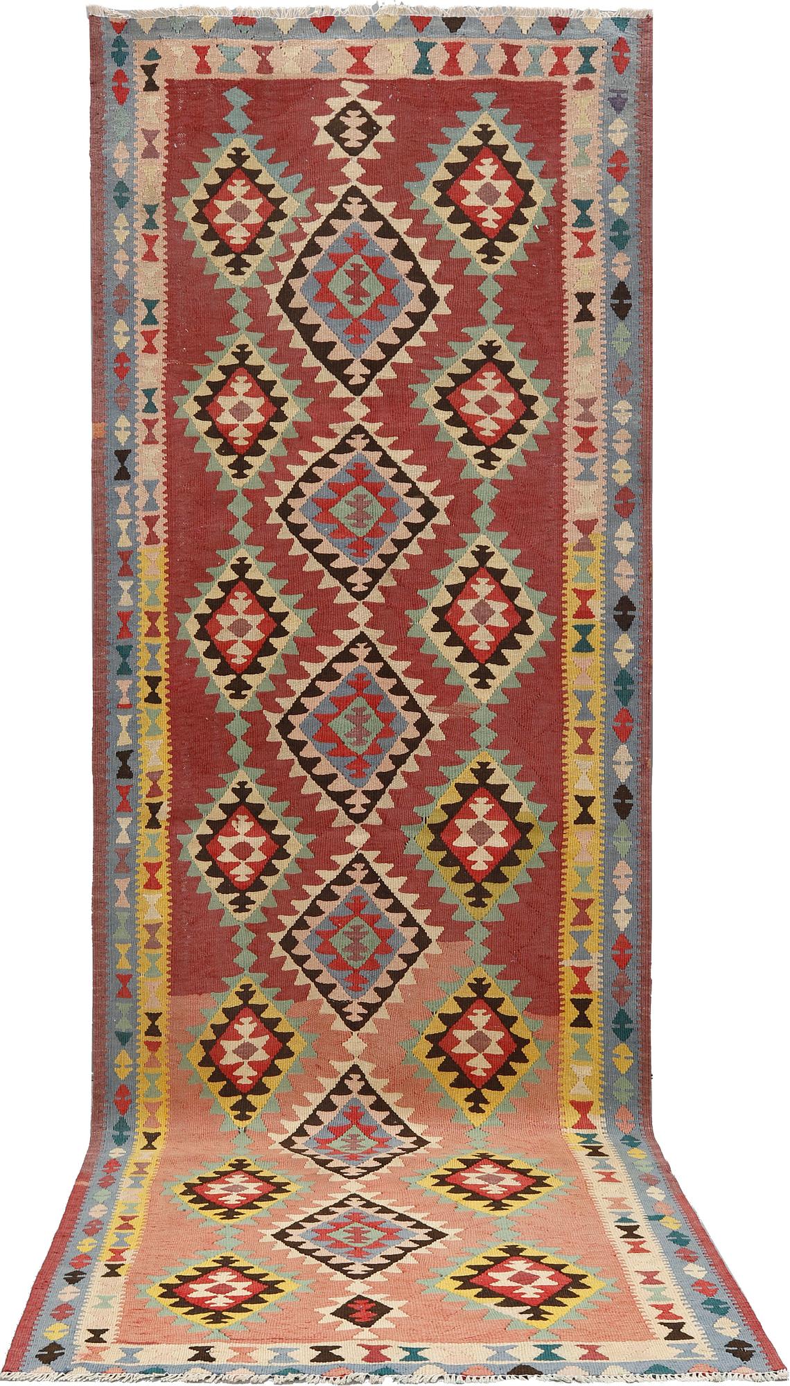 A kurdish kilim carpet, Western Iran, c 323 x 113 cm.