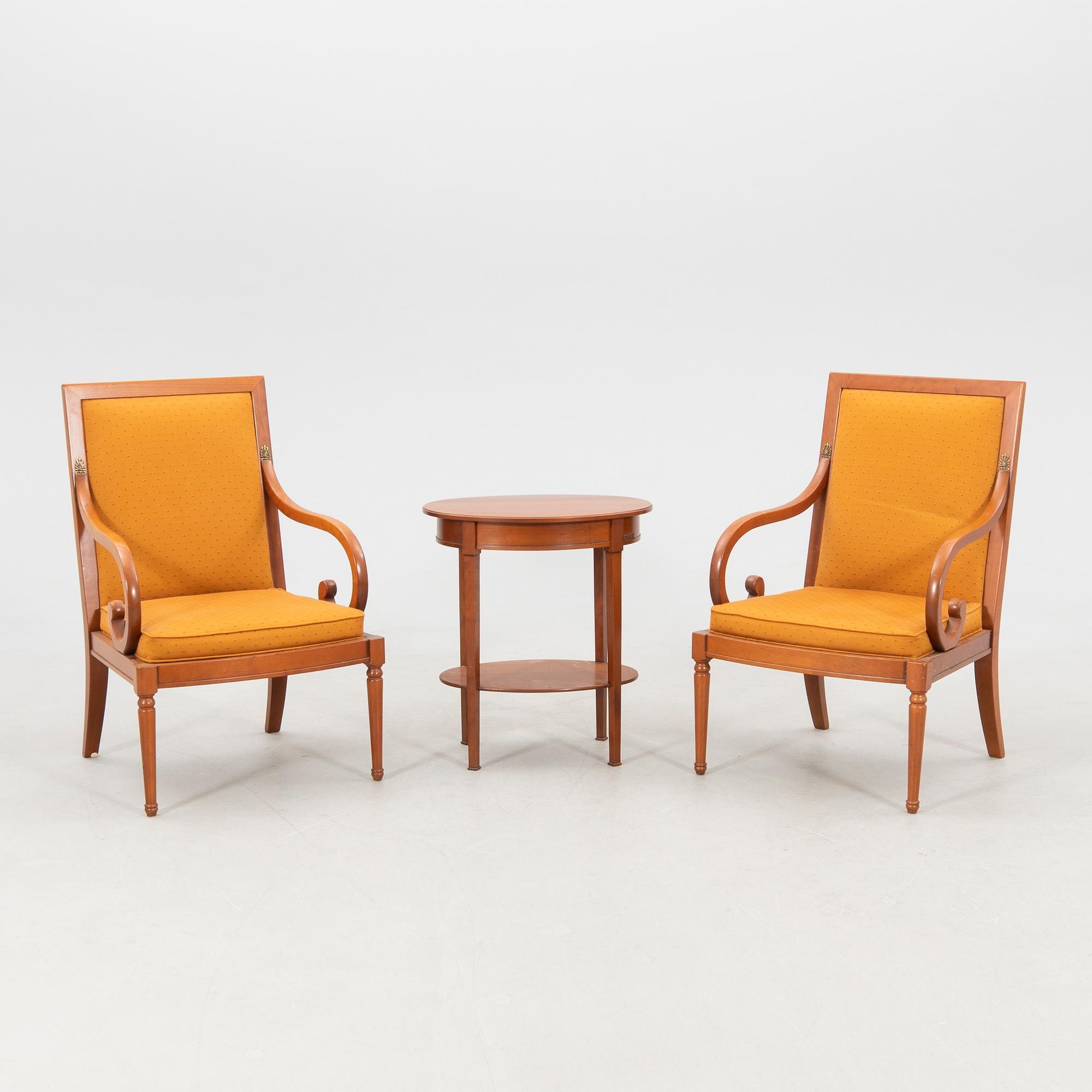 Armchairs a pair and a side table Grange France circa 2000.