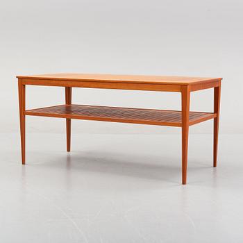 A 'Wetter' walnut coffee table by Carl Malmsten.