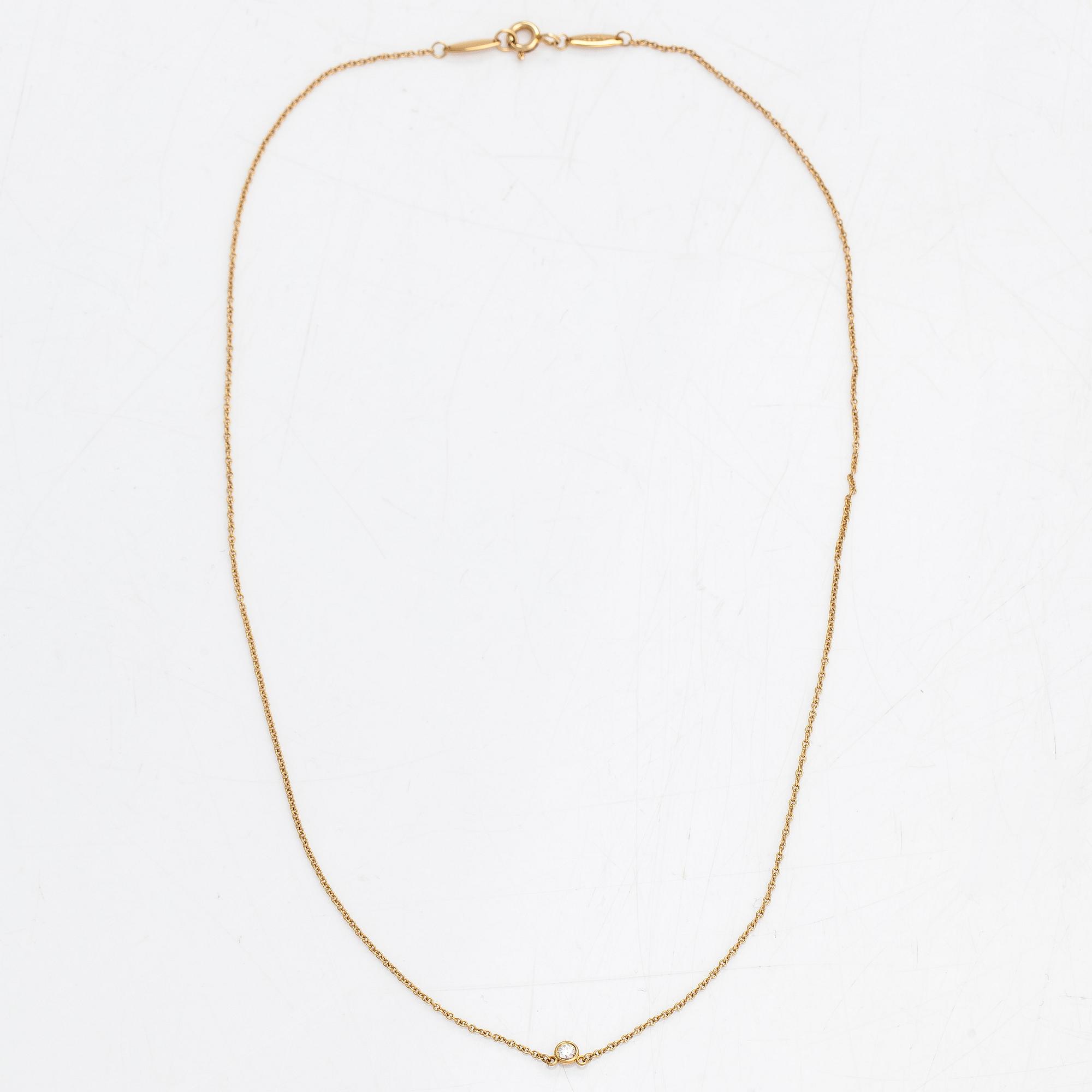 Tiffany & Co, Elsa Peretti, collier, 18K guld med en briljantslipad diamant ca 0.05 ct.