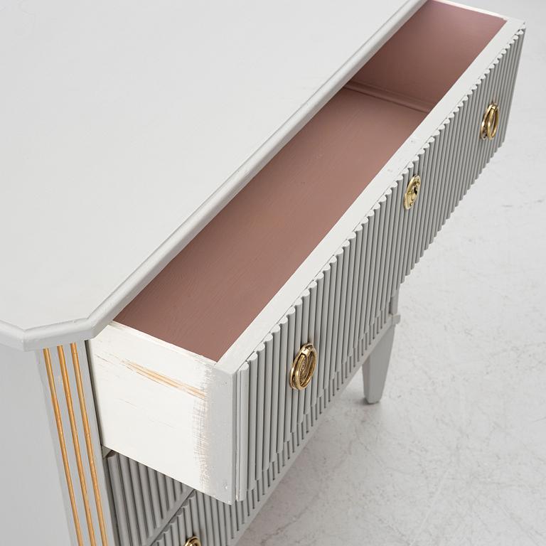 A Gustavian style chest of drawers, mid-20th century.