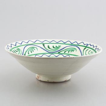 A faience bowl, circa 1900.