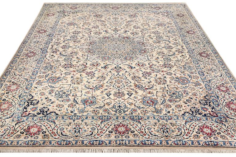 A Nain, part silk carpet, c. 474 x 322 cm.