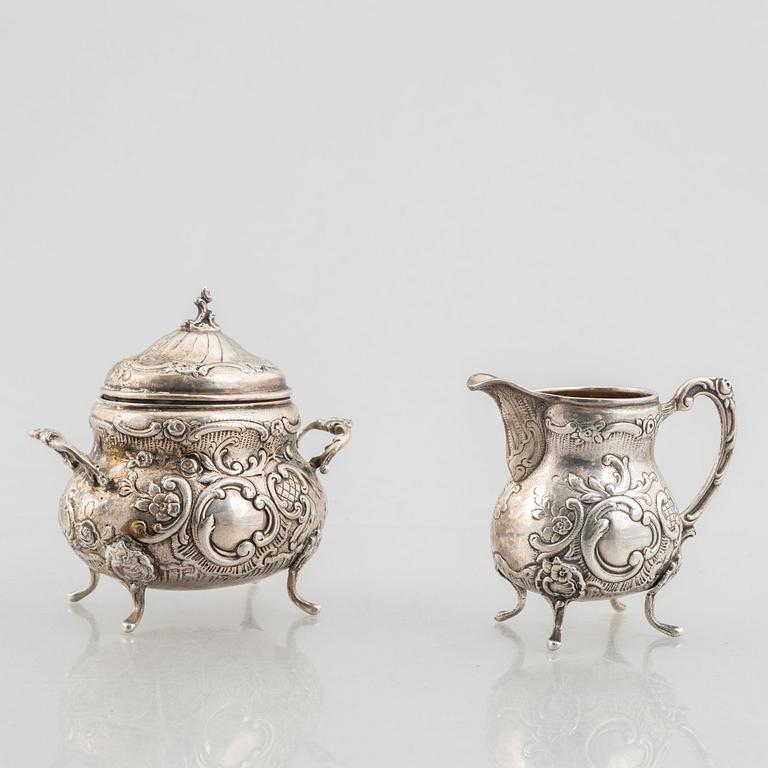 A Swedish silver sugarbowl, creamer and tray, mark of JL Hultman AB, Stockholm 1951-1952.