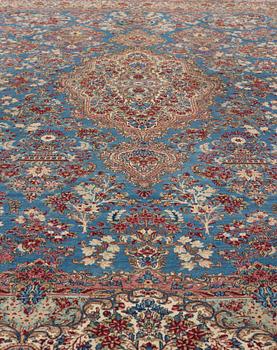 A semi-antique Kerman carpet,  440 x 296 cm.
