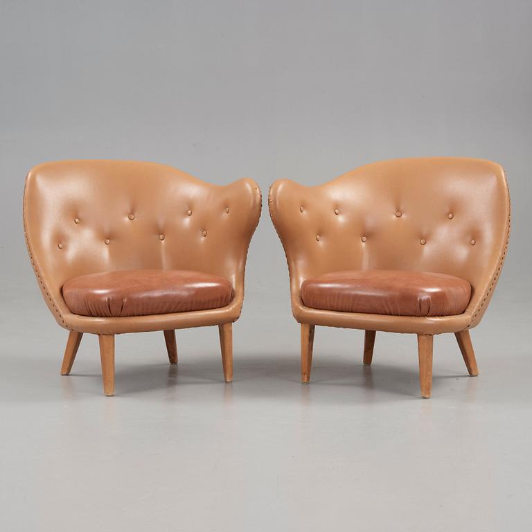 Arne Norell, A pair of Arne Norell 'Tummen/ The Thumb' easy chairs, Gösta Westerbergs Möbler, Stockholm 1950's.