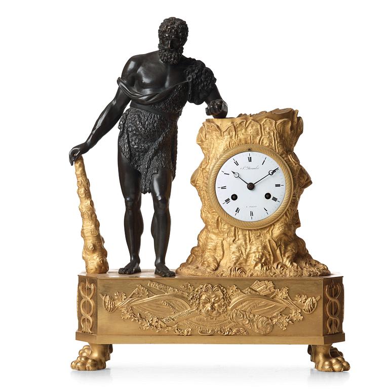 An Empire early 19th Century gilt and patinated bronze mantel clock marked by Devaulx a Paris.