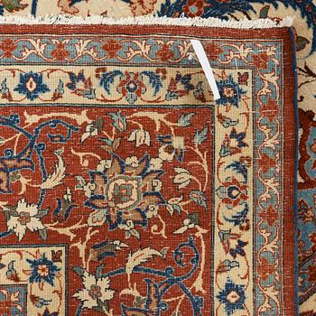 A old Esfahan carpet, around 299 x 210 cm.