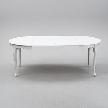 A painted Rococo style dining table, second half of teh 20th century.