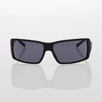 Two Pairs of Sunglasses, Prada and Chanel.