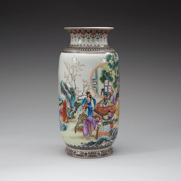 A large famille rose vase decorated with scholars in a garden, Republic.