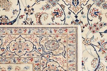 A Nain rug, Part Silk, S.K 6LAA, c. 212 x 129 cm.