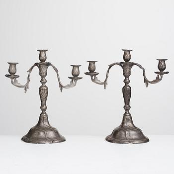 A pair of Swedish Rococo pewter three-light candelabra by Anders Wetterquist, Stockholm 1774.