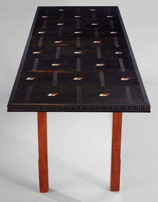 A Hjalmar Jackson ebony and pear wood desk / library table, Stockholm 1934, possibly designed by Oscar Nilsson.