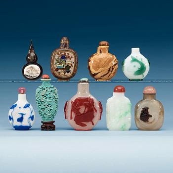 1445. A group of nine peking glass, porcelain, stone, cloisonné and bone snuff bottles.