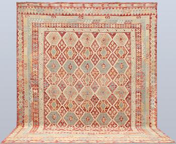 A Kilim carpet, approx. 379 x 313 cm.