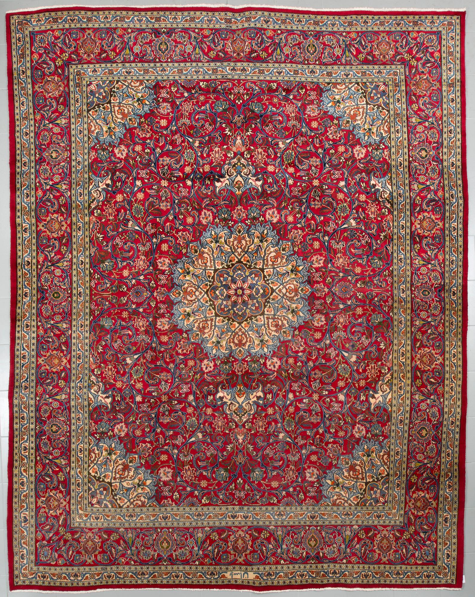 A Semnan rug, signed, 388 x285 cm.