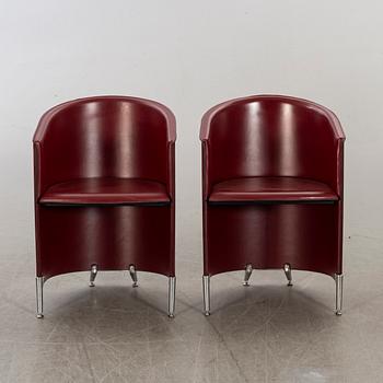 A pair of late 20th century armchairs.