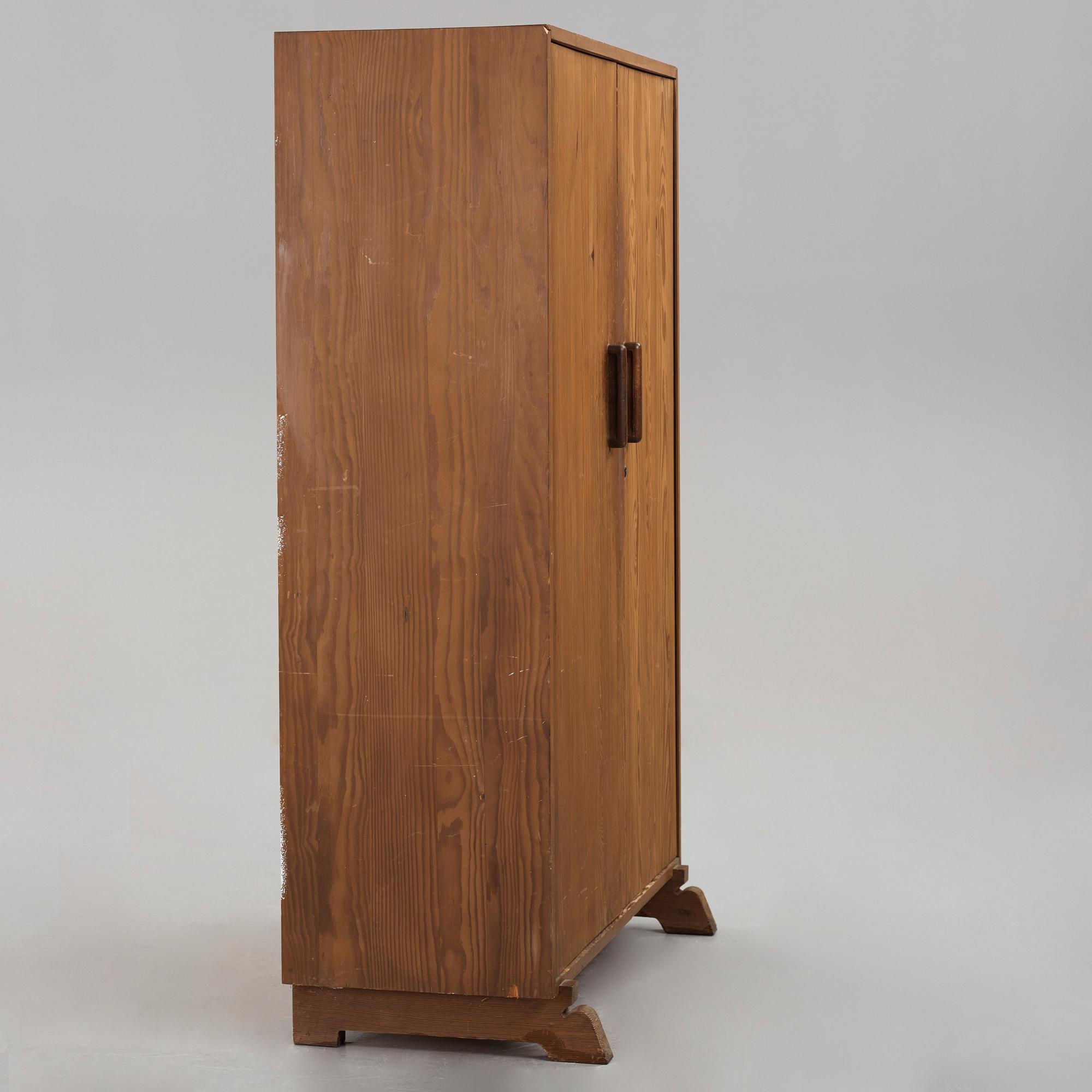Axel Einar Hjorth, a stained pine cabinet "Sport", Nordiska Kompaniet 1930's.