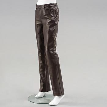 Apair of dark brown leather pants by ralph lauren.