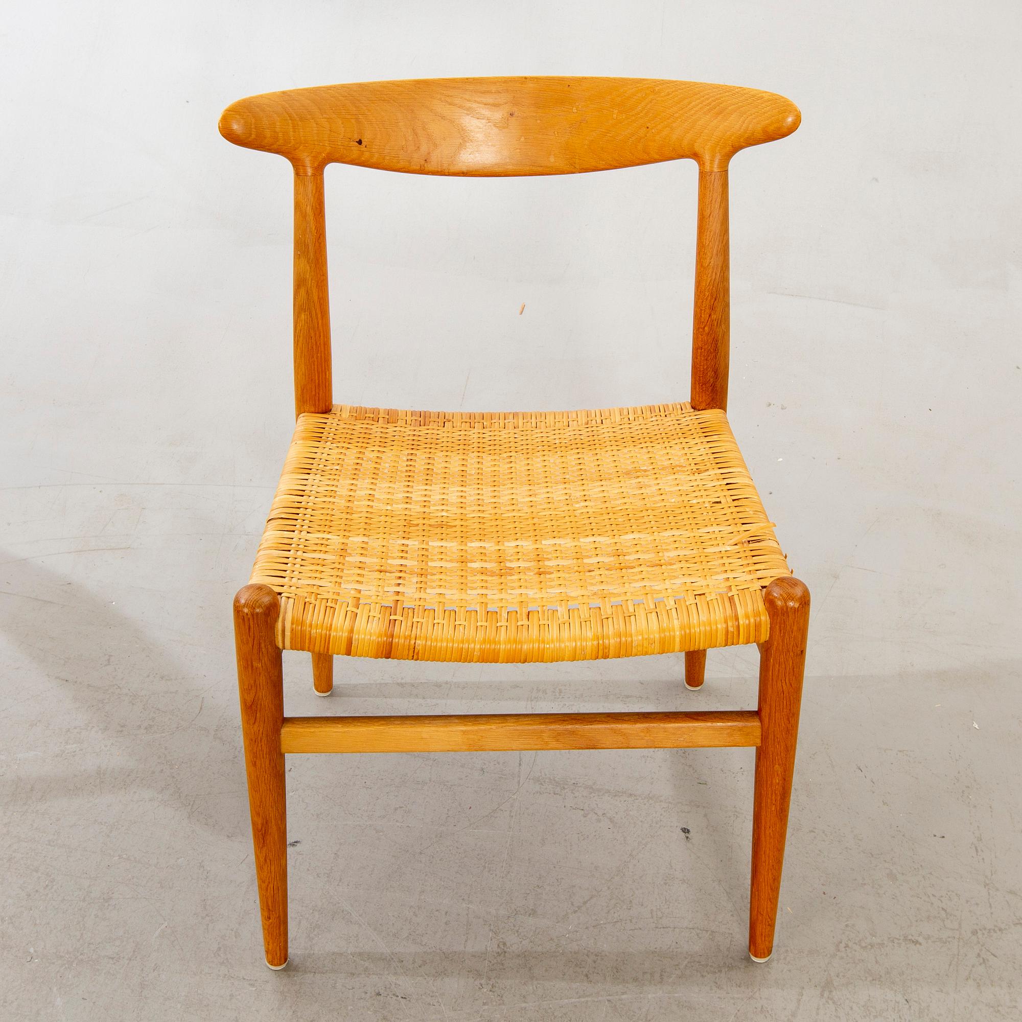 Four model 'W2' oak chairs by Hans Wegner for C.M. Madsen, Denmark, designed 1953.