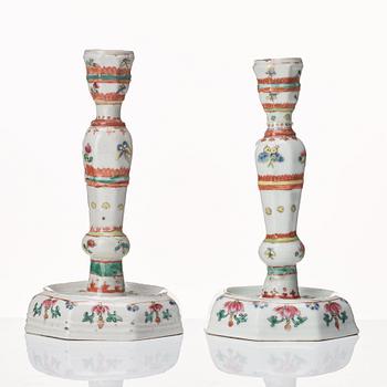 Two famille rose candle sticks, Qing dynasty, 18th Century.