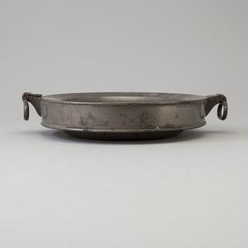 A 19th century pewter plate.