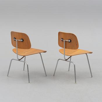 CHARLES & RAY EAMES, a pair of DCM chairs from Herman  Miller.