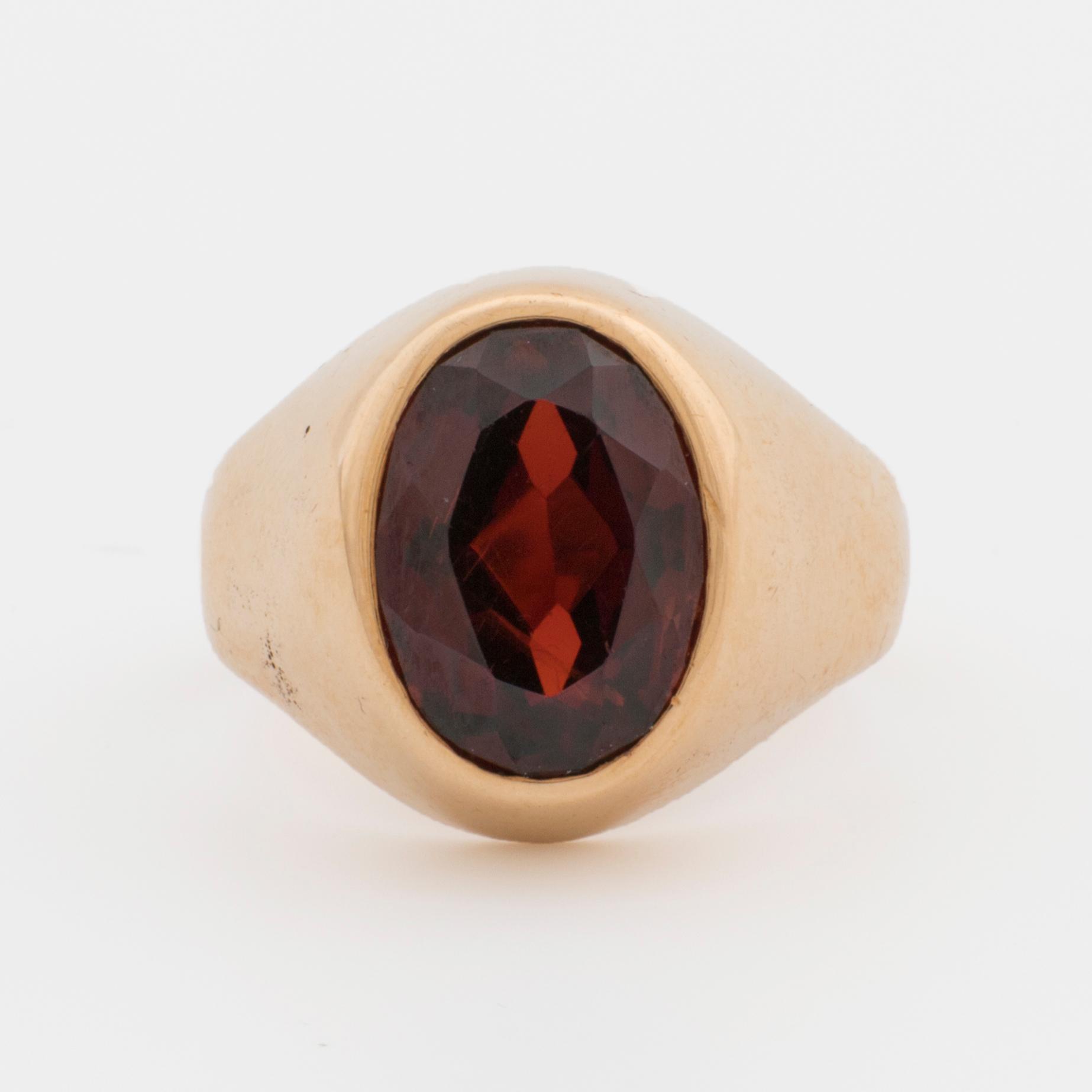 RING 18K guld almandin granat.