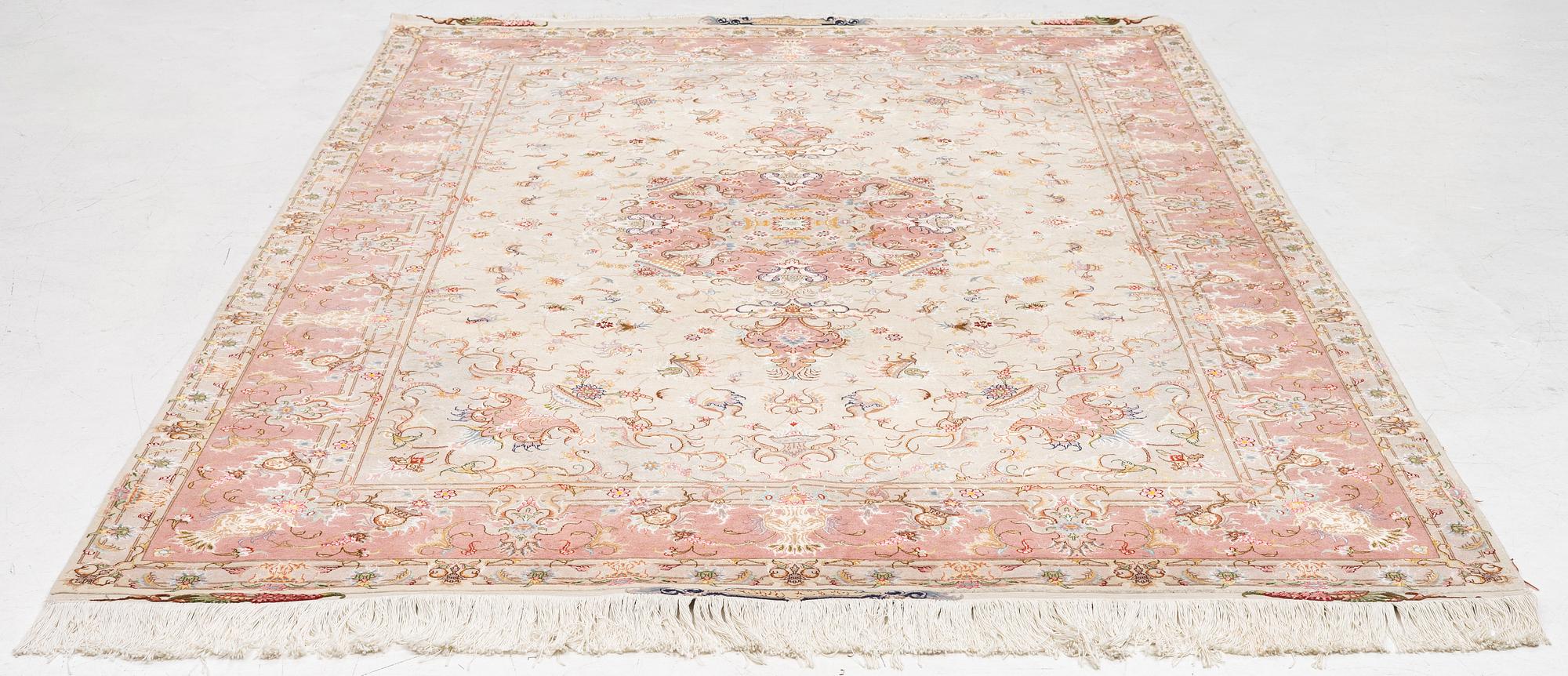 Rug, Tabriz, approx. 305 x 203 cm.
