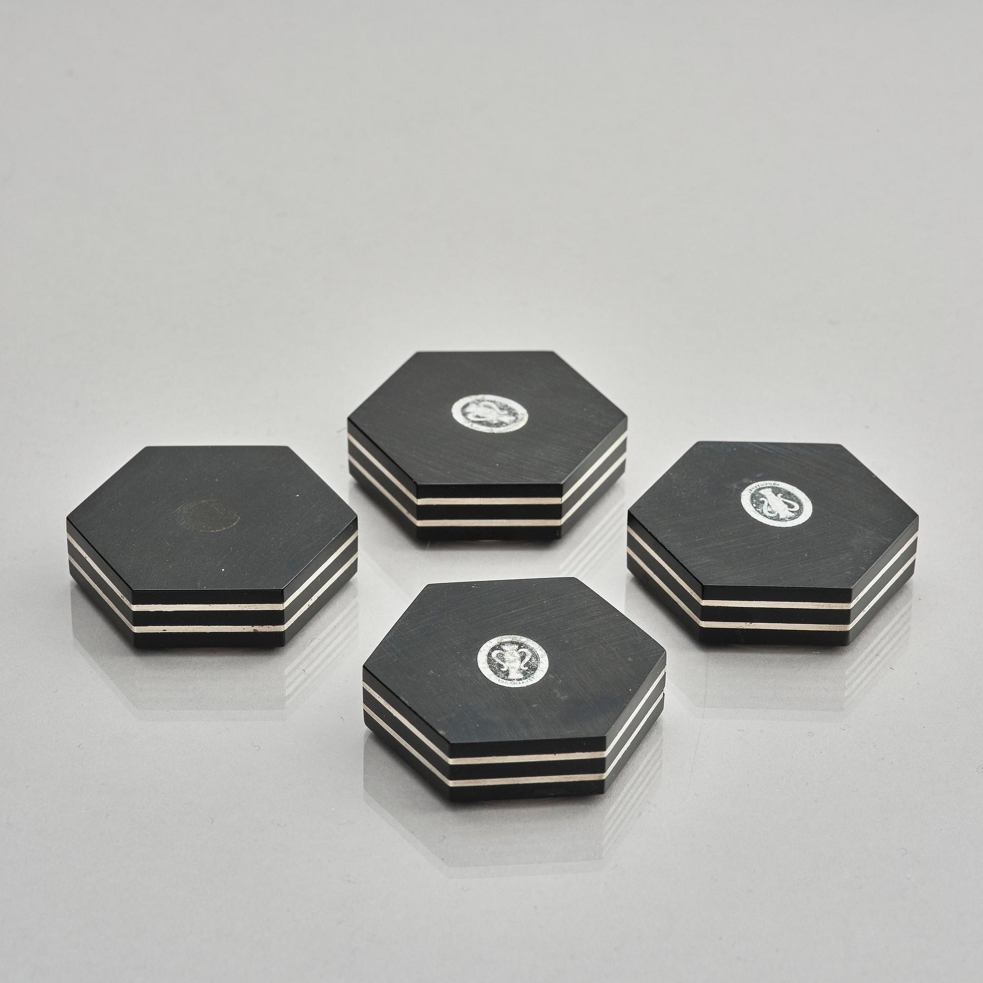 Guldsmedsaktiebolaget (GAB), four silver and bakelite salt-cellars, design by Eric Pihlgren, Stockholm, Sweden 1938.
