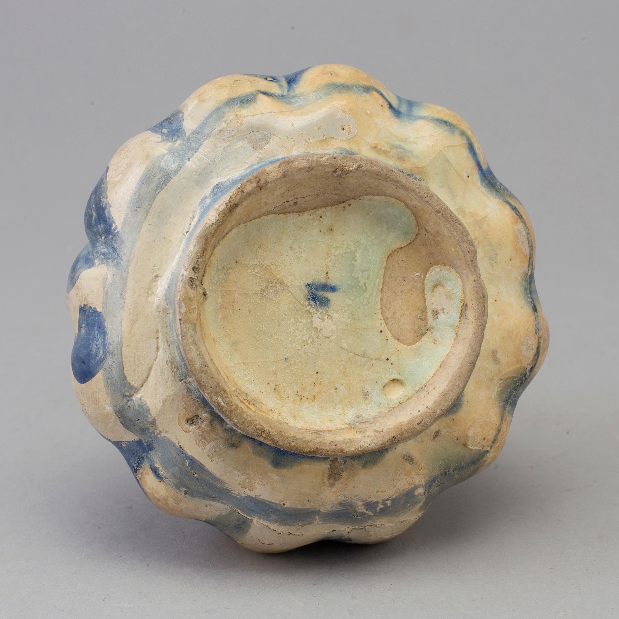 A 13th century persian pottery vase.