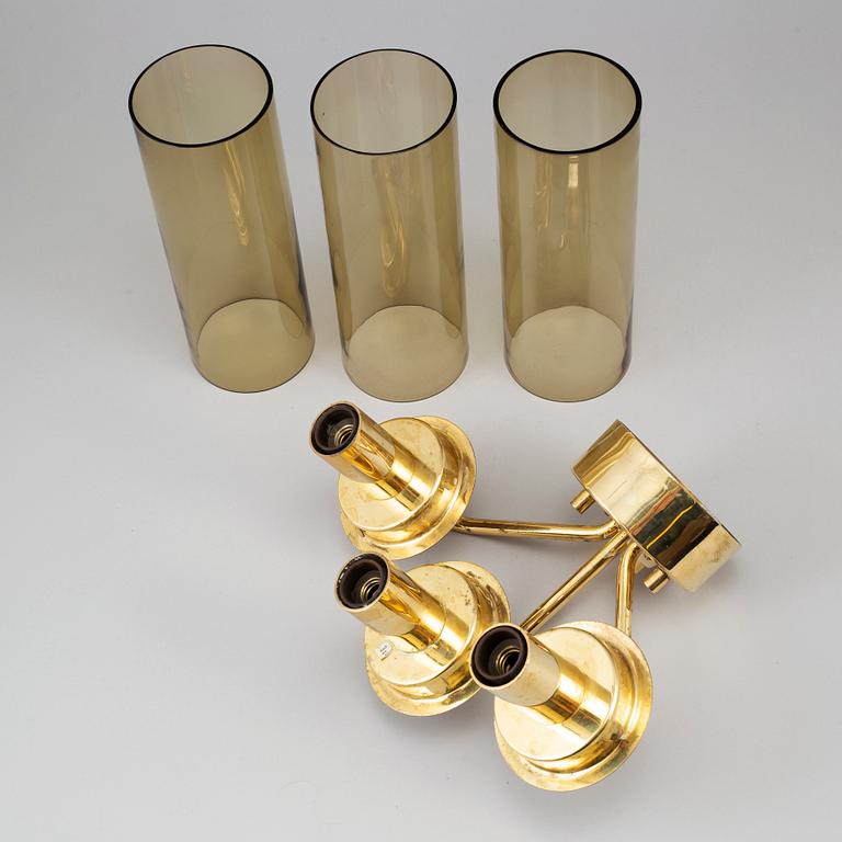 A pair of brass and glass wall sconces by Hans-Agne Jakobsson, Markaryd, second half of the 20th century.