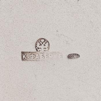 K. Fabergé, a silver sugar bowl and cream jug, Imperial Warrant mark, Moscow ca. 1913.
