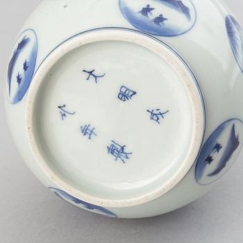 A Japanese blue and white 'Arita ware' bottle vase, 19th century.