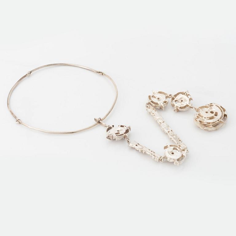 Juhls silver necklace.