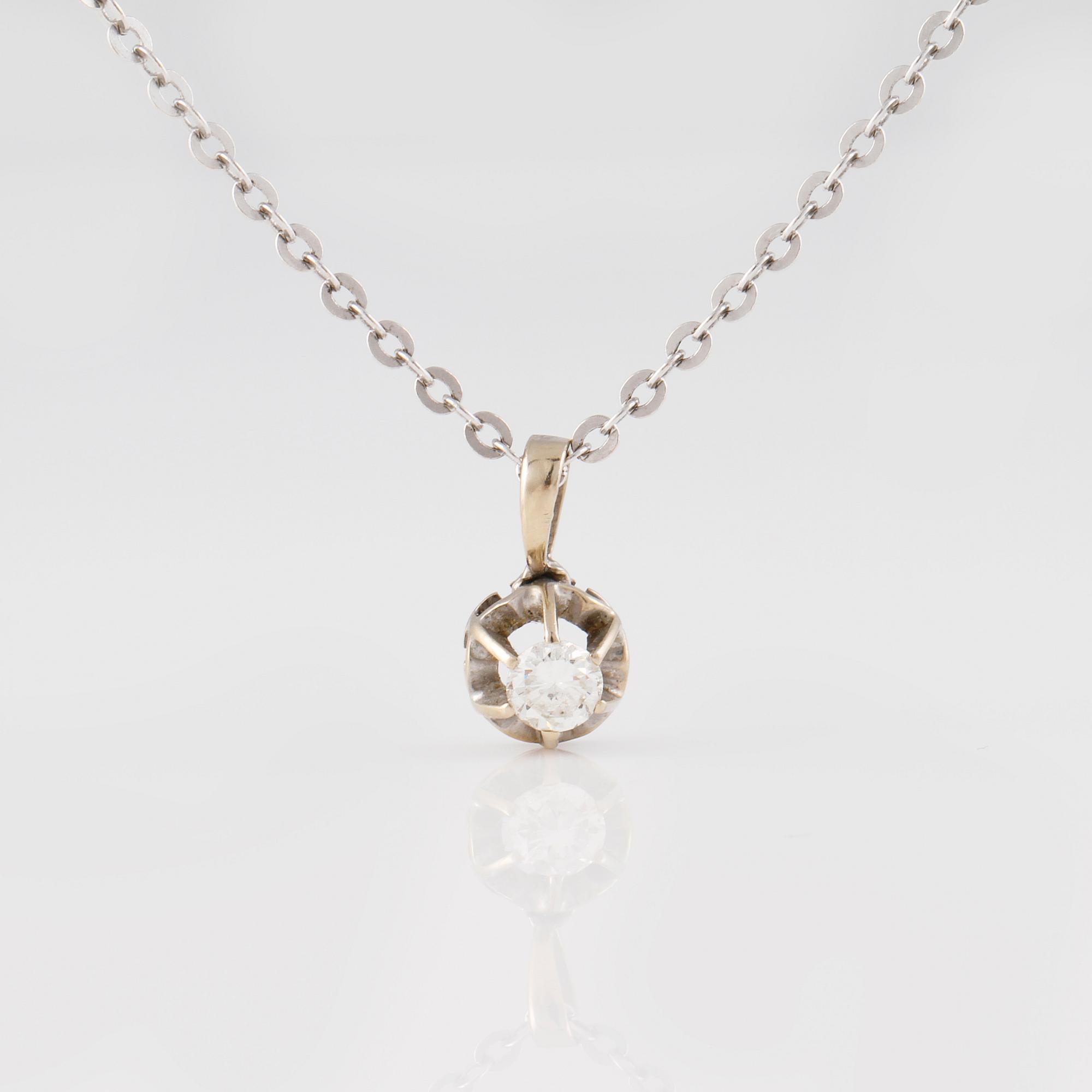 HÄNGE, 18K vitguld med briljantsliapd diamant ca 0.25 ct. Vikt 4,7 gram.