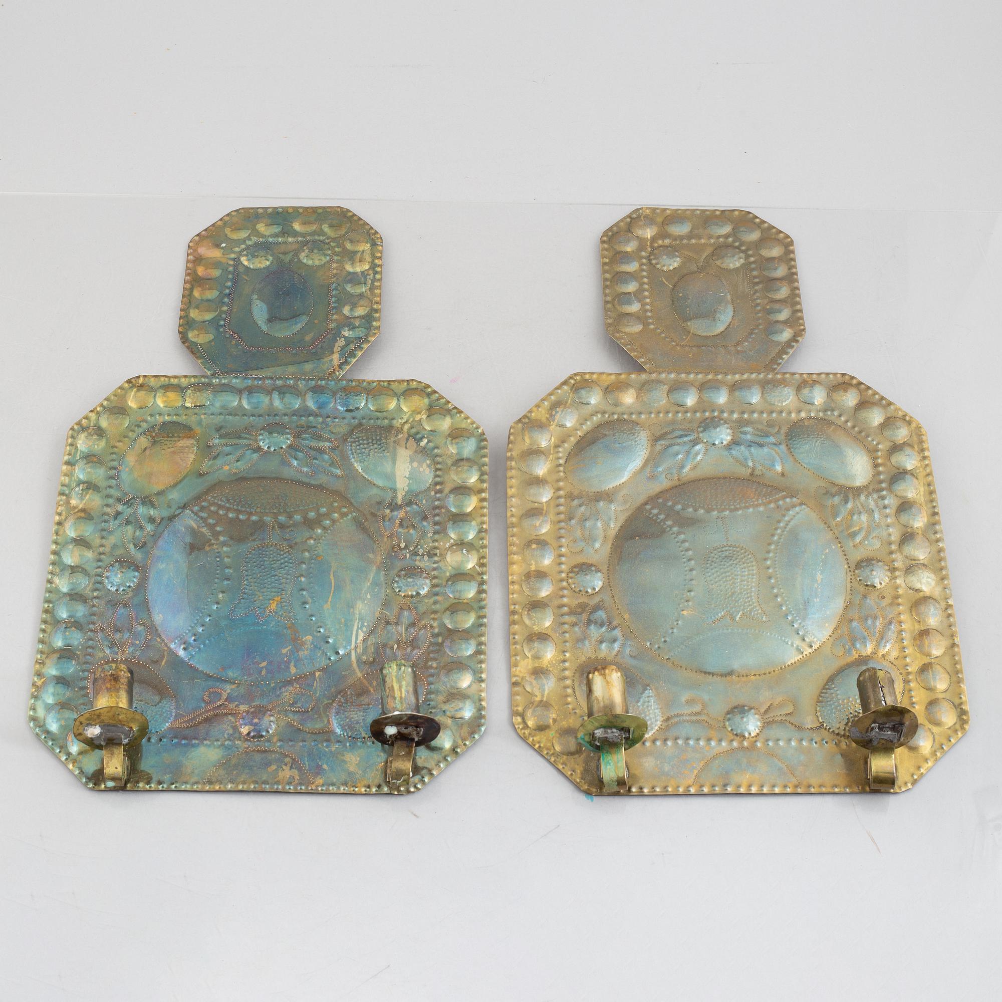 A pair of Baroque style wall sconces, circa 1900.