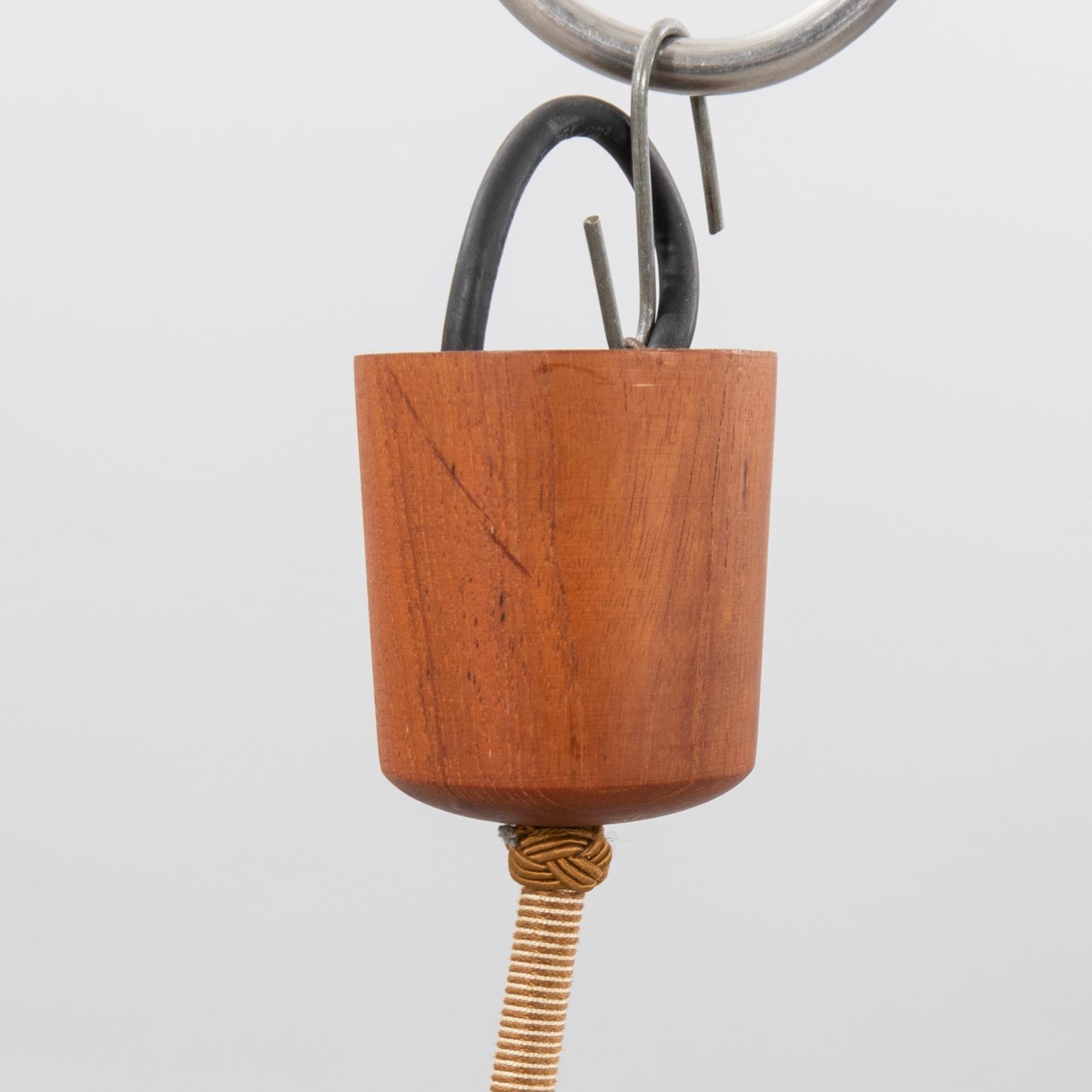 A 1950/60s teak ceiling pendant.