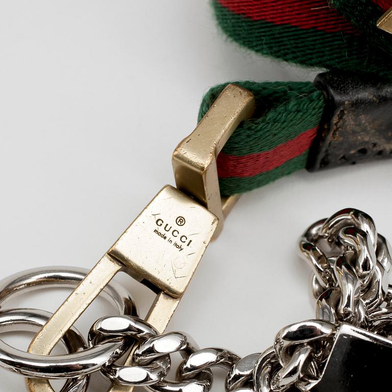 GUCCI, a dog leash.