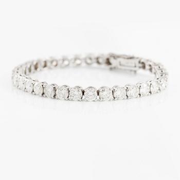 Tennis bracelet, 18K white gold with brilliant-cut diamonds.